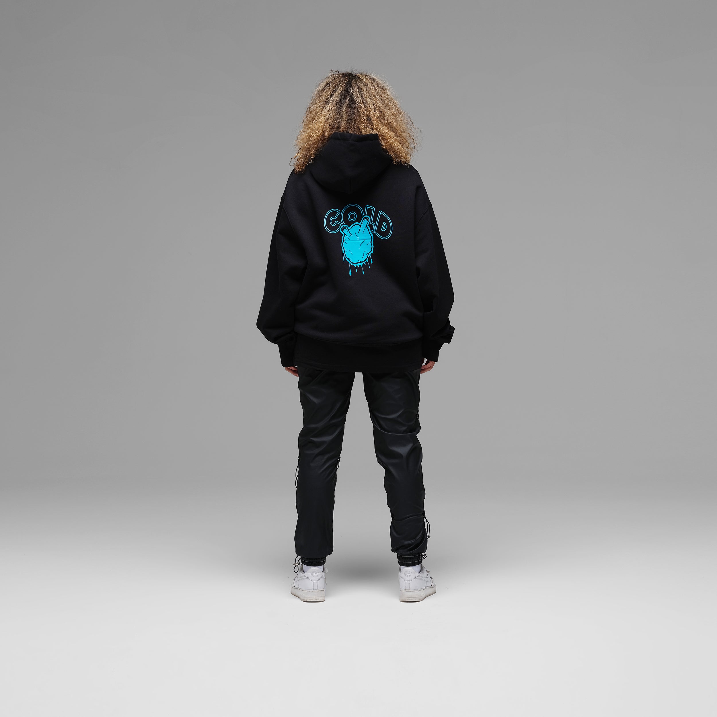 'Cold Heart' Black Hoodie by Taschan